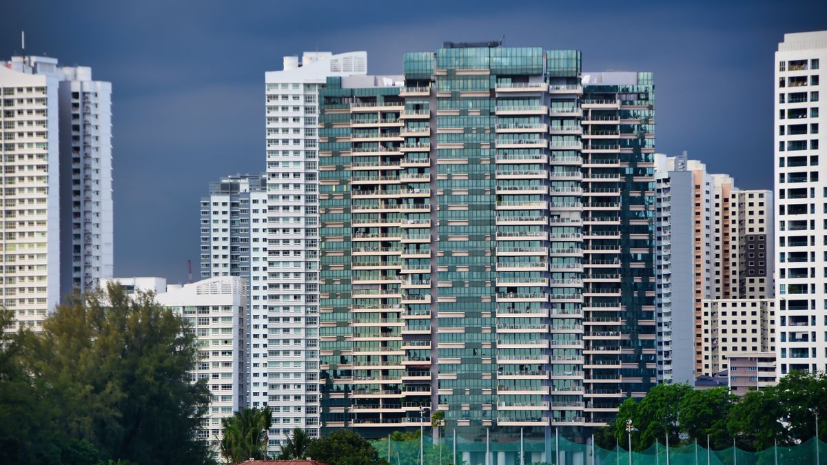 Singapore REIT property investment building with rental yield analysis charts