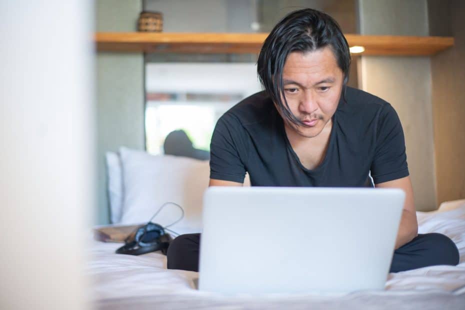 Singapore Side Income Tax 2026 - freelancer working laptop