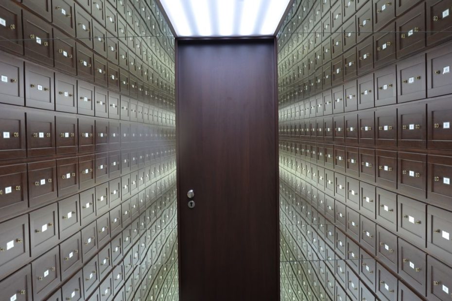 Fixed deposits Singapore 2026 - locked savings boxes in a bank vault